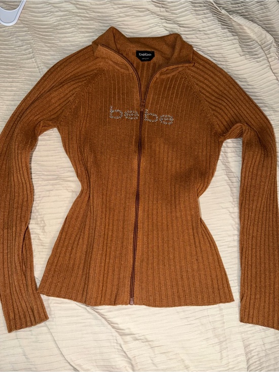 bebe Sweaters - bebe Rust Ribbed Zip-Front Cardigan with Crystal Logo